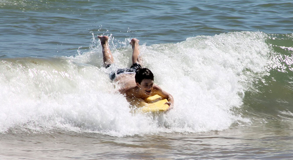 bodyboarding kid